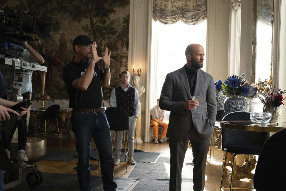 This image released by Amazon MGM Studios shows director David Ayer, left, and Jason Statham on the set of "The Beekeeper." (Amazon MGM Studios via AP)