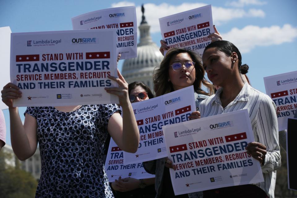 Protesters join a rally at the US Capitol in April 2019 against a ban on transgender service members in the US military. (Getty Images)