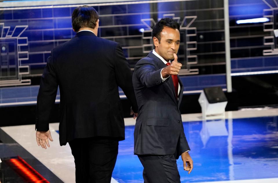 Businessperson Vivek Ramaswamy gives the thumbs up sign before the start of the Republican National Committee presidential primary debate hosted by NBC News at Adrienne Arsht Center for the Performing Arts of Miami-Dade County.