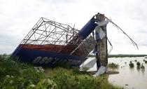 A fallen advertising billboard is seen at Ha Long Bay in the aftermath of typhoon Haiyan in Vietnam's northern Quang Ninh province, 180 km (112 miles) from Hanoi November 11, 2013. (REUTERS/Kham)