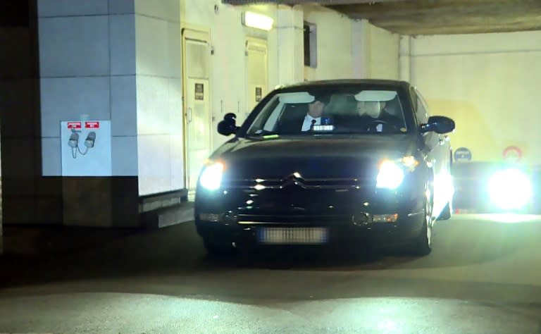 Sarkozy's car left a police building in Nanterre, a Paris suburb, late on Tuesday