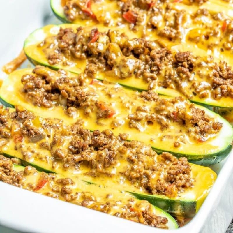 <p>Homemade Interest</p><p>Zucchini stuffed with ground beef and peppers, topped with cheese and salsa.</p><p><strong>Get the recipe: </strong><a href="https://www.homemadeinterest.com/tex-mex-zucchini-boats-with-10-minute-salsa/" rel="nofollow noopener" target="_blank" data-ylk="slk:Taco Zucchini Boats;elm:context_link;itc:0;sec:content-canvas" class="link "><strong>Taco Zucchini Boats</strong></a></p>