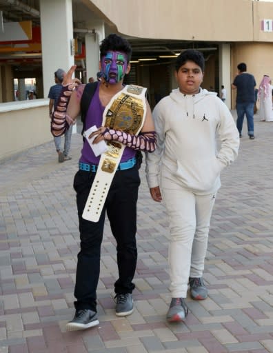 Saudi youths arrive to attend the World Wrestling Entertainment (WWE) Greatest Royal Rumble event in the Saudi coastal city of Jeddah