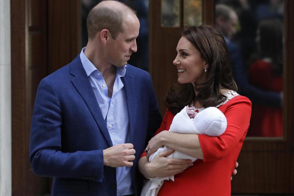 The Duke and Duchess of Cambridge with their new son outside the Lindo Wing at St Mary's, Paddington: AP