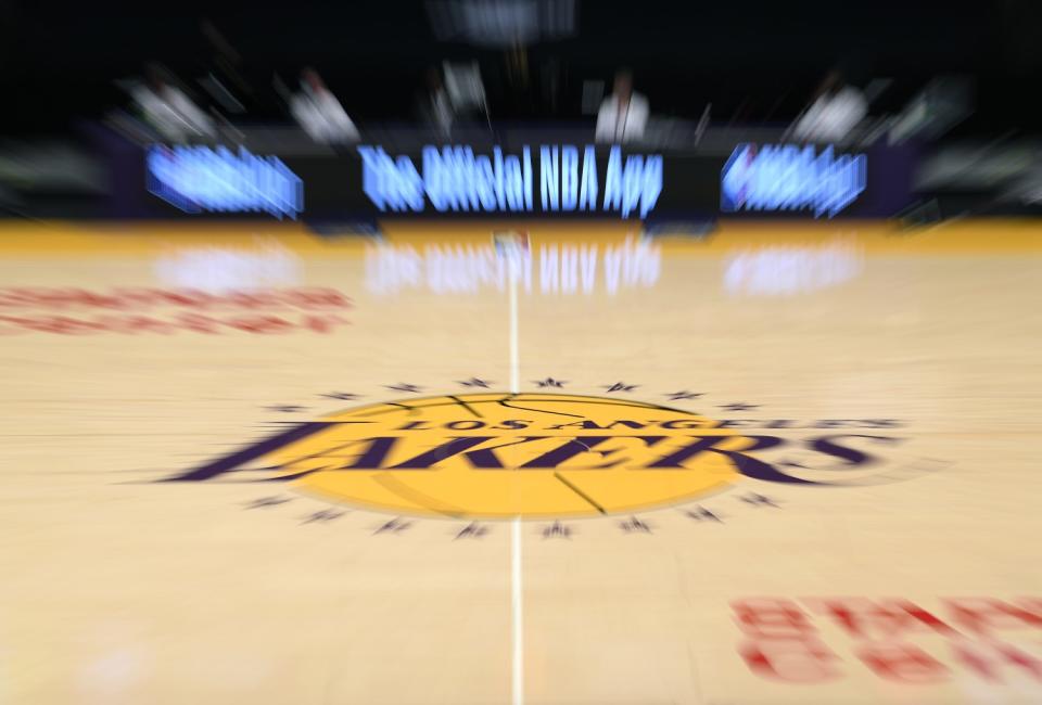 Lakers center court logo during a preseason game.