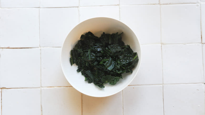 Bowl of wilted blanched kale
