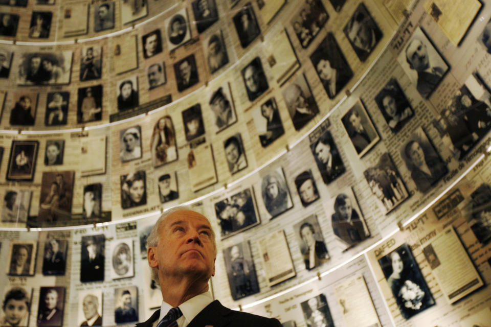 FILE - Then-Vice President Joseph Biden visits the Hall of Names at the Yad Vashem Holocaust memorial in Jerusalem, March 9, 2010. President Joe Biden has spent decades as a stalwart supporter of Israel, a connection rooted in dinner table conversations with his father about the Holocaust. Now his devotion is back in the spotlight after last week's Hamas attacks that caused the largest loss of Jewish life in a single day since the Holocaust. (AP Photo/Ariel Schalit, File)