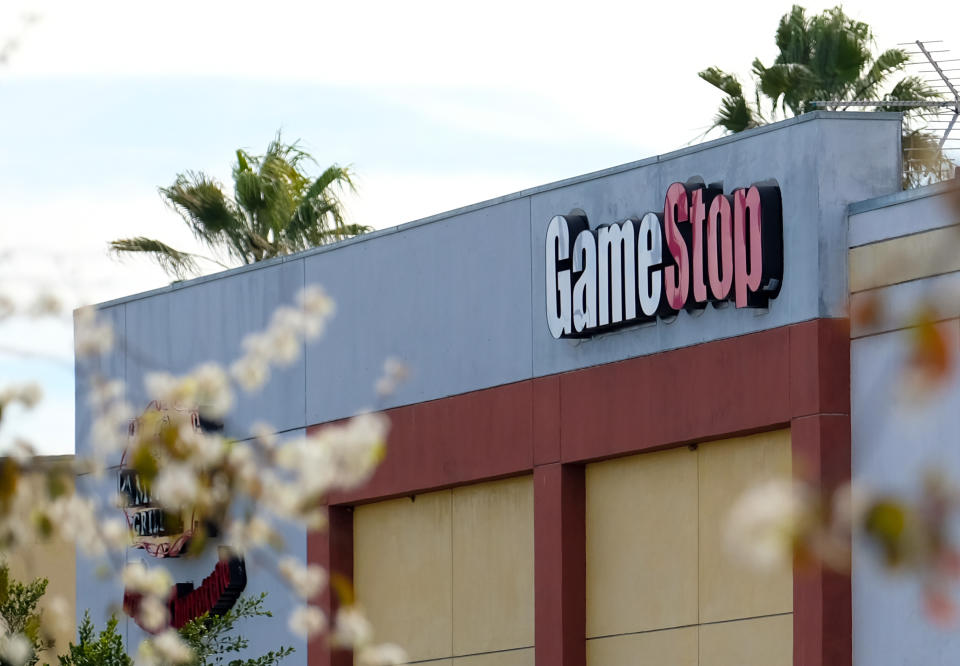 The GameStop logo sign is seen above the store in Culver City, California on January 28, 2021. - An epic battle is unfolding on Wall Street, with a cast of characters clashing over the fate of GameStop, a struggling chain of video game retail stores. The conflict has sent GameStop on a stomach-churning ride with amateur investors taking on the financial establishment in the mindset of the Occupy Wall Street movement launched a decade ago. (Photo by Chris DELMAS / AFP) (Photo by CHRIS DELMAS/AFP via Getty Images)