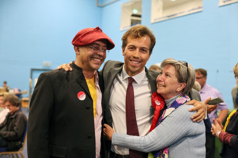 Noah Law, Labour candidate wins the seat for St Austell and Newquay constituency at the election count in Truro College Sports Hall, and is congratulated by his mum and dad, Sue and Stuart Law.