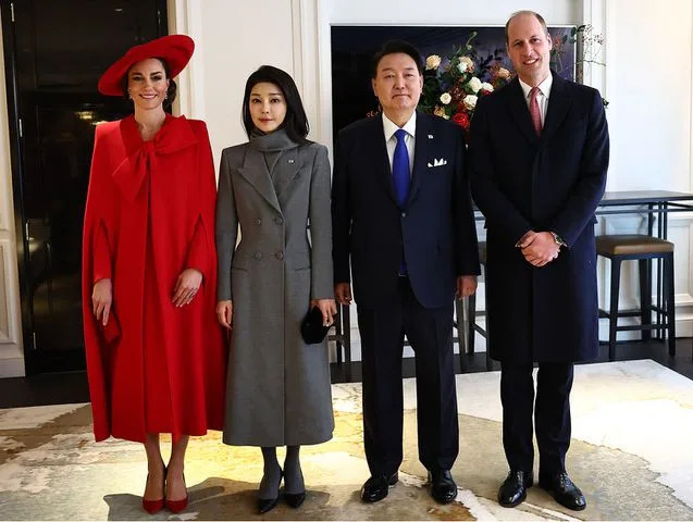 <p>HENRY NICHOLLS/POOL/AFP via Getty Images</p> Kate Middleton and Prince William with South Korea's President Yoon Suk Yeol and his wife Kim Keon Hee