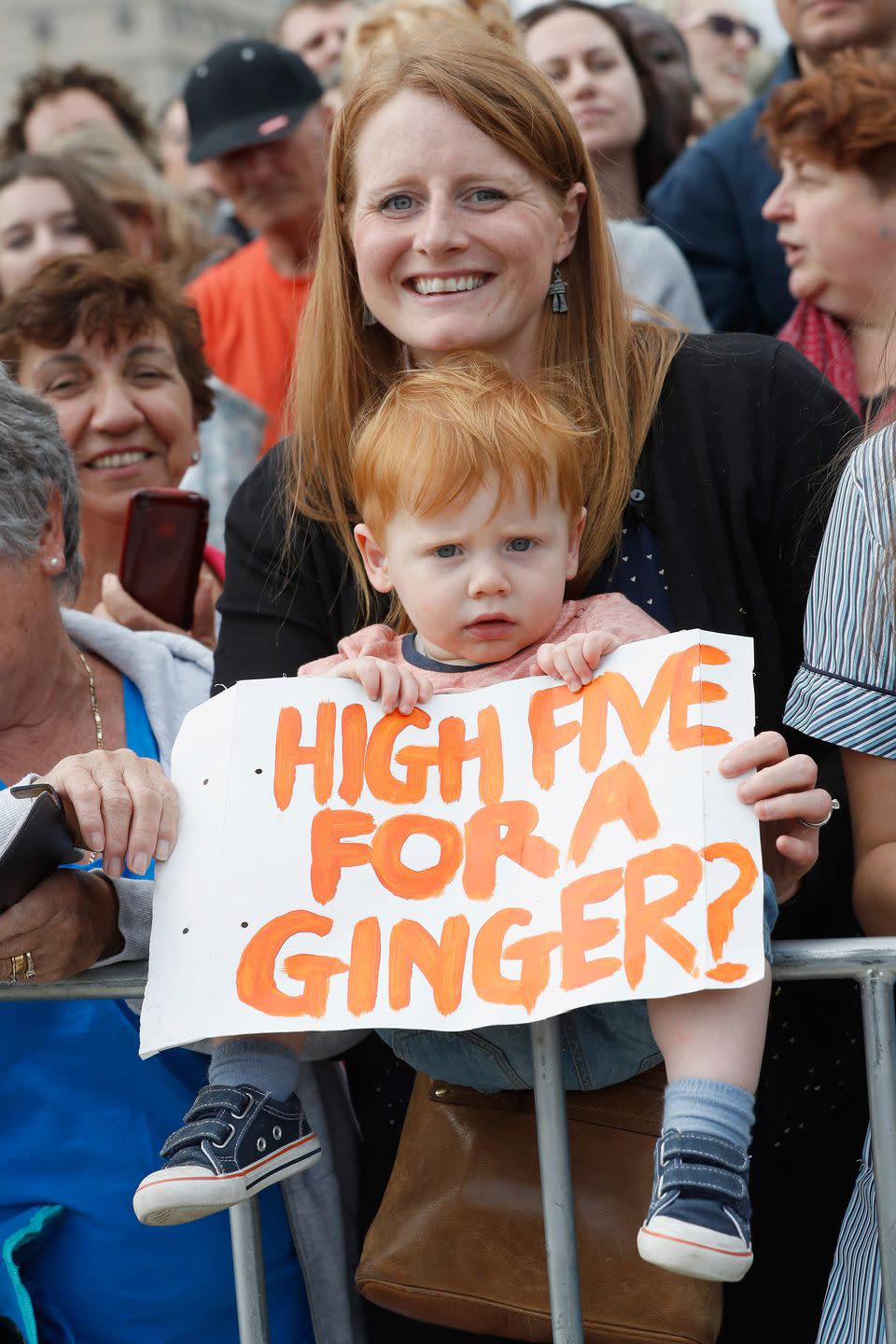 <p>We can only hope this red-headed youngster got his wish for a high five.</p>