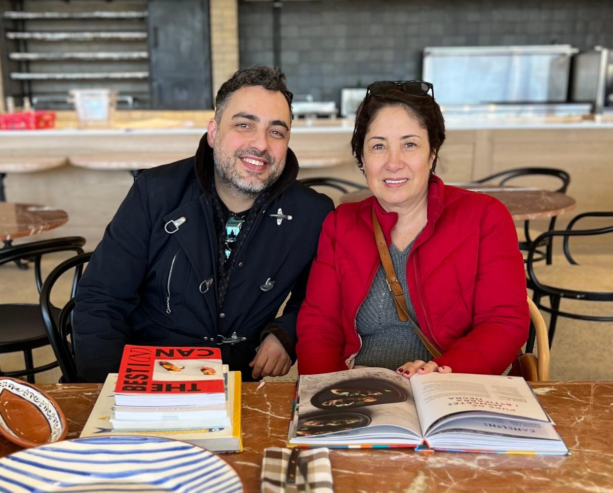 David Viana with his mother, Rosa Lita Viana, inside Lita restaurant.