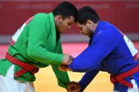 Kurash is an ancient sport thought to date back more than 3,000 years (AFP/PUNIT PARANJPE)
