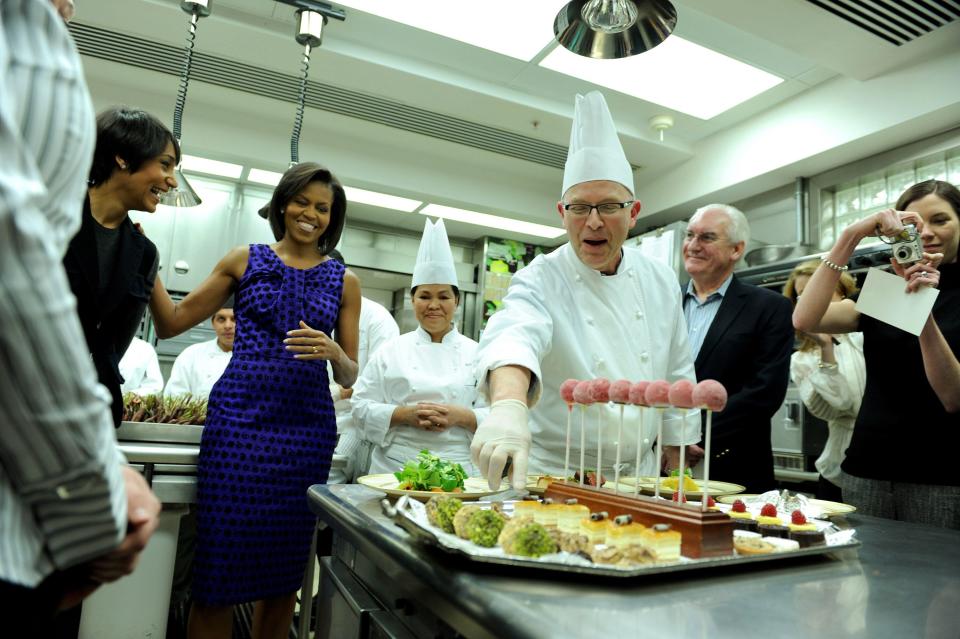 White House pastry chef Bill Yosses describes the desserts offered at a dinner for U.S. governors to first lady Michelle Obama in 2009. (Pool via Getty Images)