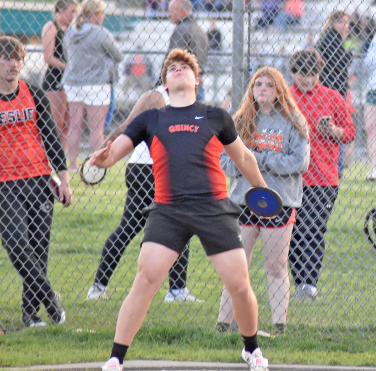 Quincy's Ethan Pearson showcases his throwing skills with his off hand as an injury to his right shoulder has forced him to make different arrangements to compete