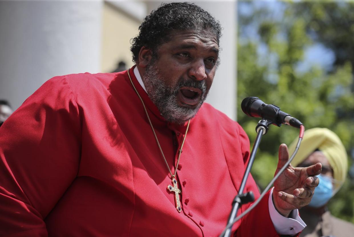 <span class="caption">Rev. Dr. William J. Barber II addresses protesters gathered at St. John's Episcopal Church in Washington D.C.</span> <span class="attribution"><a class="link " href="https://www.gettyimages.com/detail/news-photo/rev-dr-william-j-barber-ii-alongside-with-faith-leaders-news-photo/1220016808?adppopup=true" rel="nofollow noopener" target="_blank" data-ylk="slk:Oliver Contreras/For The Washington Post via Getty Images;elm:context_link;itc:0;sec:content-canvas">Oliver Contreras/For The Washington Post via Getty Images</a></span>