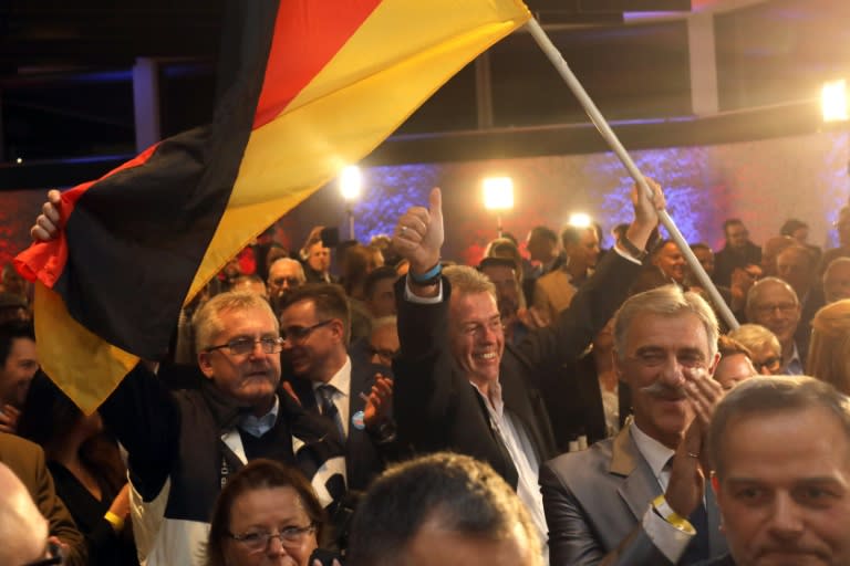 AfD supporters celebrate in Hesse where they achieved a key goal by entering the last of the country's 16 state assemblies