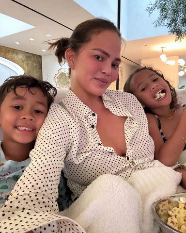 <p>Chrissy Teigen/Instagram</p> Chrissy Teigen with her kids Miles and Luna