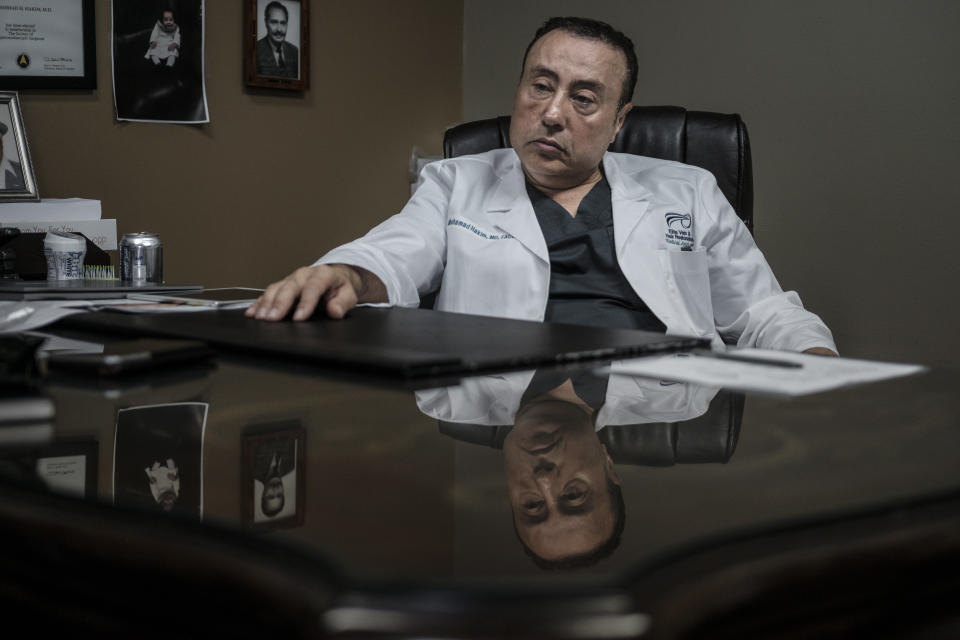 Dr. Mohamad Hakim in his office in Dearborn.