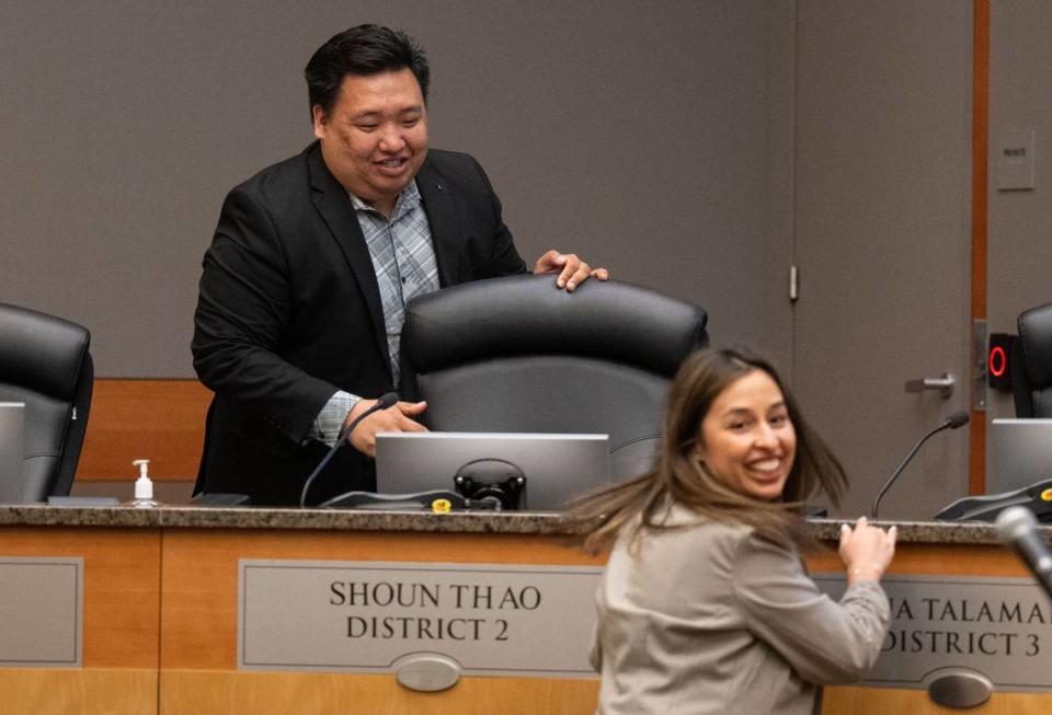Interim District 2 Sacramento City Councilman Shoun Thao is greeted by Councilwoman Karina Talamantes before taking his seat for the first time on Tuesday.