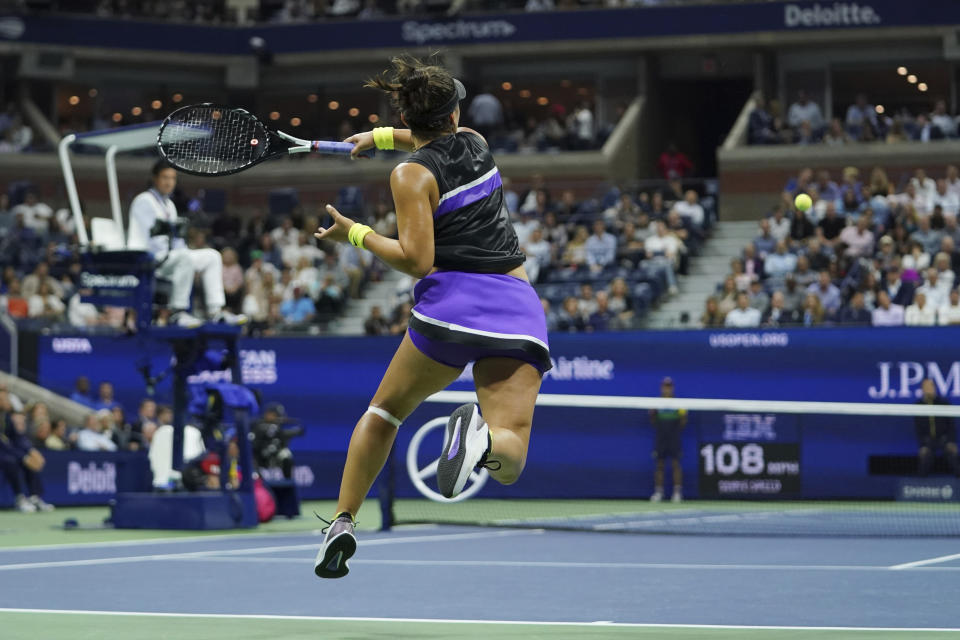 Bianca Andreescu, of Canada, returns a shot to Belinda Bencic, of Switzerland, during the semifinals of the U.S. Open tennis championships Thursday, Sept. 5, 2019, in New York. (AP Photo/Eduardo Munoz Alvarez)