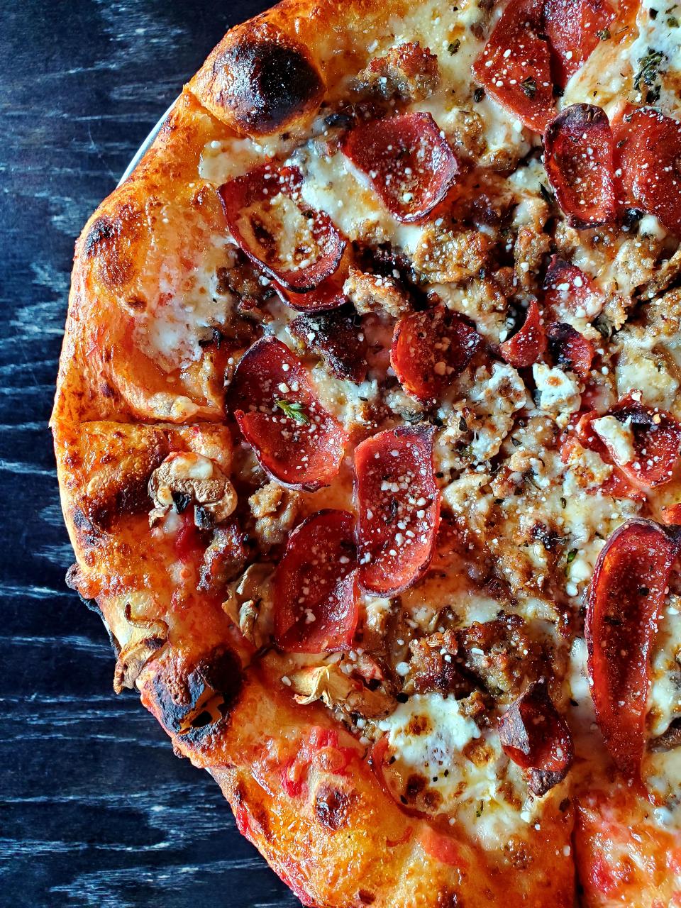 Coal's Artisan Pizza's Middletown Pizza for Louisville Pizza Week features Italian sausage, pepperoni, wild mushrooms, fresh mozzarella and oregano and romano.