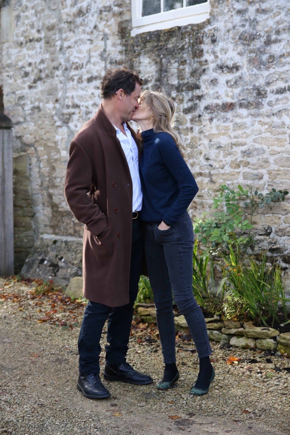 Dominic West and his wife Catherine Fitzgerald seen together at their family home after pictures emerged of the British actor kissing younger actress Lily James in Rome. The pair said they are staying together in a handwritten note that stated: 