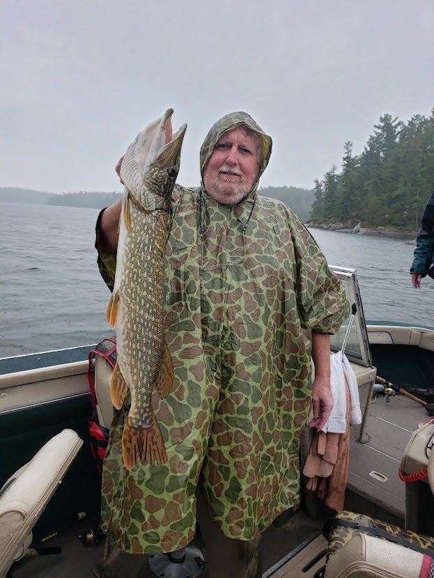 Eric Staats with a fish he caught on Lake of the Woods in Sioux Narrows, Ontario.