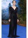 <p>Angelina Jolie wears custom-made Atelier Versace to a private reception as costumes and props from Disney's Maleficent go on exhibit at Kensington Palace in support of the Great Ormond Street Hospital.</p>