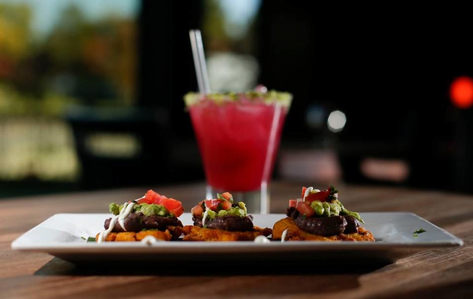 Chef Jonathan Lundy’s Nachos Cubano, based on crispy tostones made of plantains as a base, topped with black bean, guacamole and pico, were part of a cosmopolitan Latin cuisine menu overhaul at Coba Cocina in 2014.