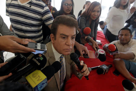 Honduran opposition candidate Salvador Nasralla addresses the media after the U.S. backed the re-election of Honduran President Juan Orlando Hernandez despite allegations of fraud by the opposition, in Tegucigalpa, Honduras December 22, 2017. REUTERS/Jorge Cabrera