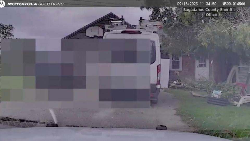 This still image from Sagadahoc County Sheriff’s Office shows dash camera video from Sept. 16, 2023 as police approach Robert Card's father's house. (Sagadahog County Sheriff's office/Portland Press Herald via AP)