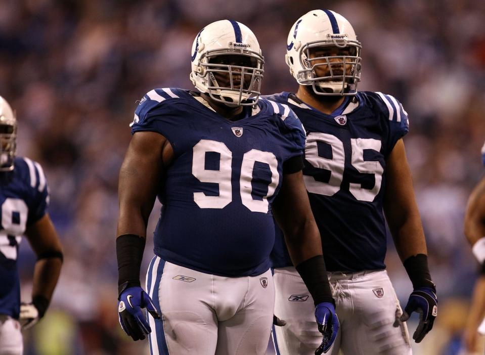 Former NFL player Daniel Muir (center) is accused of striking his 14-year-old son, Bryson, who has been missing since late June. (Getty Images)