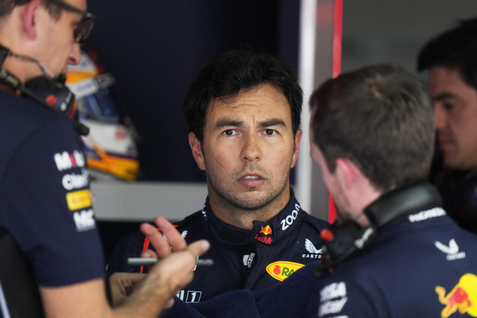 Red Bull driver Sergio Perez of Mexico looks on during the first free practice at the Dino and Enzo Ferrari racetrack, in Imola, Italy, Friday, May 17, 2024. The Italy's Emilia Romagna Formula One Grand Prix will be held on Sunday. (AP Photo/Luca Bruno)