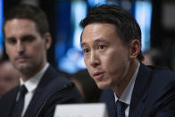 TikTok CEO Shou Zi Chew, testifies during a Senate Judiciary Committee hearing on Capitol Hill in Washington, Wednesday, Jan. 31, 2024, on child safety. Snap CEO Evan Spiegel, left, listens.(AP Photo/Manuel Balce Ceneta)