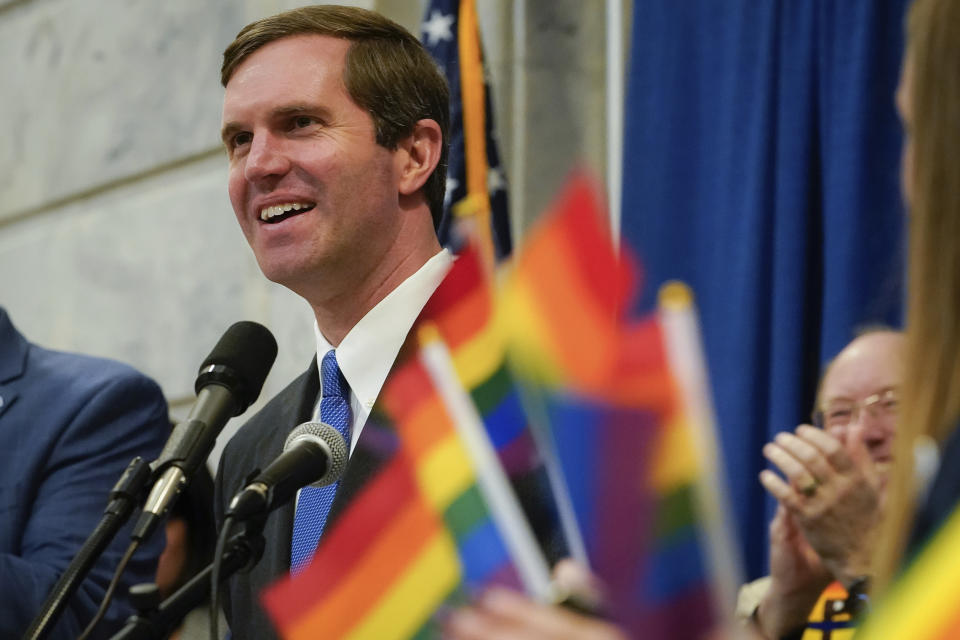 Kentucky Democratic Gov. Andy Beshear speaks a rally held by Fairness Campaign to advance LGBTQ rights, Wednesday, Feb. 19, 2020, in the Rotunda at the State Capitol, Frankfort, Ky. (AP Photo/Bryan Woolston)