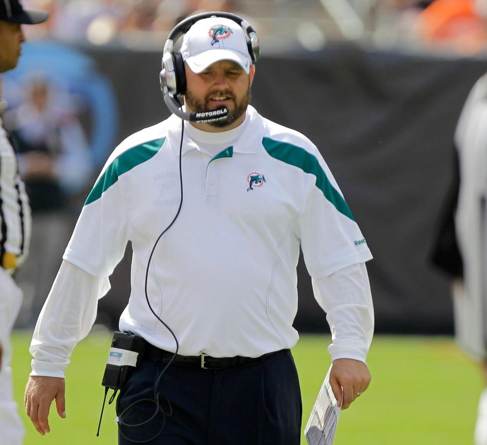 Miami Dolphins offensive coordinator Brian Daboll walks the sidelines during an NFL football game against the Cleveland Browns Sunday, Sept. 25, 2011, in Cleveland. (AP Photo/Mark Duncan)