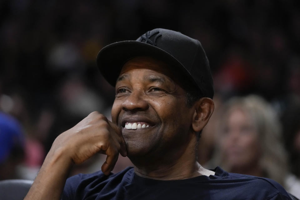 Actor Denzel Washington attends an NBA basketball game between the Los Angeles Lakers and the Golden State Warriors Sunday, March 5, 2023, in Los Angeles. (AP Photo/Jae C. Hong)