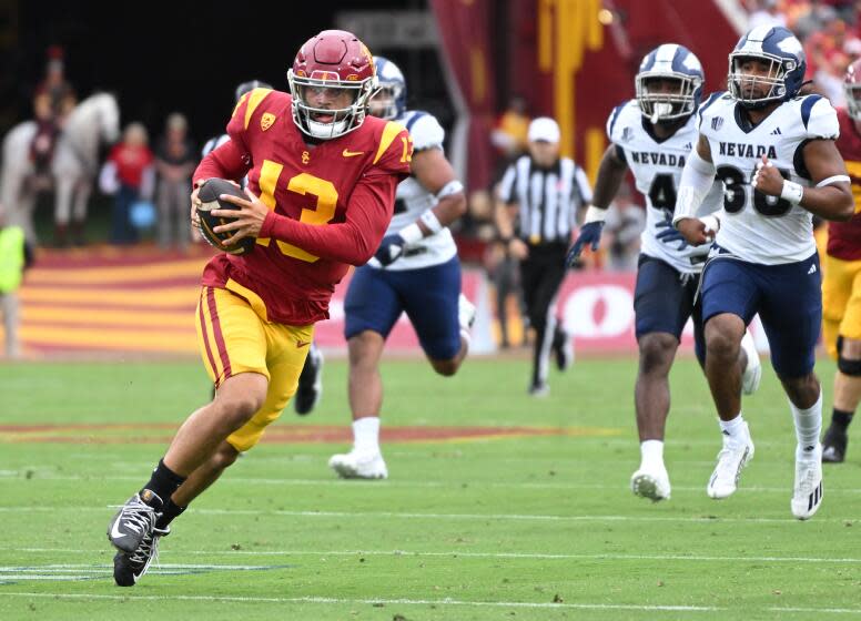 Los Angeles, California September 2, 2023-USC quarterback Caleb Williams scrambles.