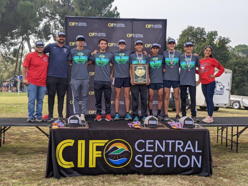 The Tulare Western boys cross country team won the 2021 Central Section Division III championship on Nov. 18 at Woodward Park in Fresno. The championship team, left to right: assistant coach Alex Martinez, coach Jordan Perry, Erik Delgado, Elian Villagran, David Sanchez, Josh Alcala-Ceballos, Santi Basurto, Carter Mendes, Joseph Flores, and coach Arianna Perry.