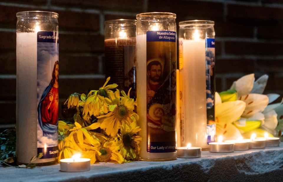 Candles and flowers left by the mother and family of Peter Romano at the scene where he was fatally shot at 2636 Bristol Pike in Bensalem on Wednesday, Nov. 1, 2023. 

[Daniella Heminghaus | Bucks County Courier Times]