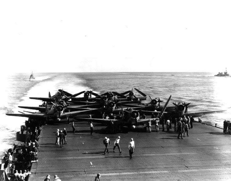 The USS Enterprise is seen here during the Battle of Midway. John L. Patton, 100, of St. Johns County was an aircraft mechanic on the flight deck of the carrier, which took three direct bomb hits during the battle on June 4, 1942.
