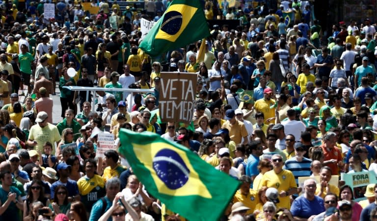 Demonstrators protest along Paulista Avenue in Sao Paulo, Brazil