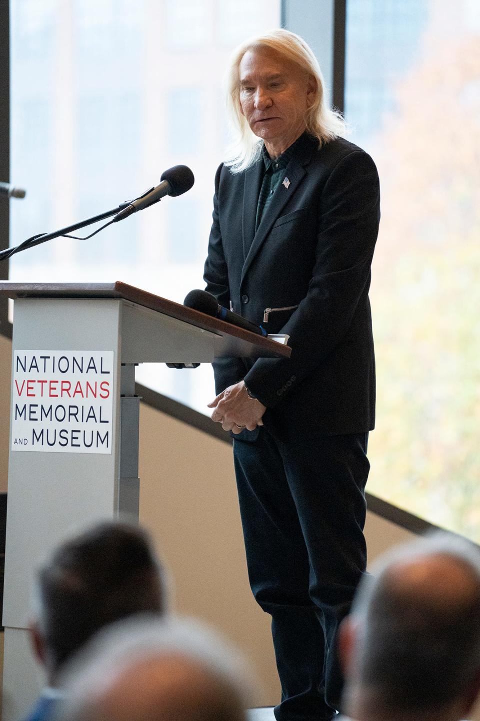 Eagles and James Gang guitarist Joe Walsh, who was 2 years old when his father died while serving in the military, addresses the crowd Friday, Nov. 11, 2022 during the annual Veterans Day ceremony at the National Veterans Memorial and Museum in Columbus.