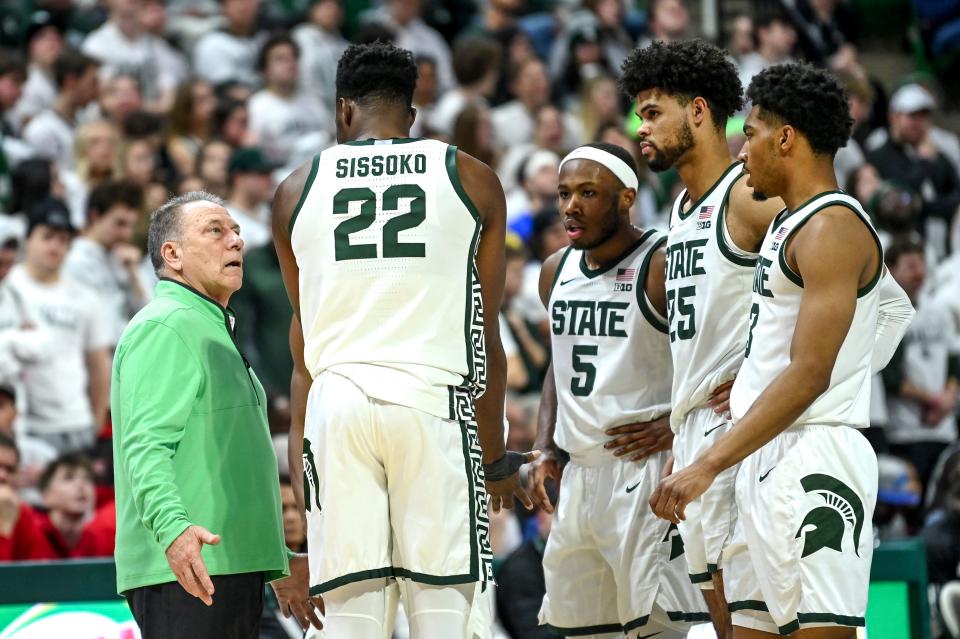 Michigan State's head coach Tom Izzo, left, talks to the team during the second half in the game against Rutgers on Sunday, Jan. 14, 2024, at the Breslin Center in East Lansing.