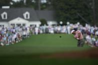 Tiger Woods hits from the fairway on the first hole during the first round of the Masters golf tournament at Augusta National Golf Club, Thursday, April 11, 2024, in Augusta, Ga. (AP Photo/Matt Slocum)
