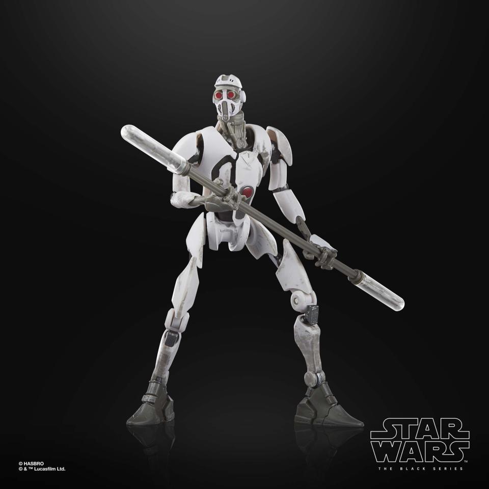 The Black Series Magnaguard action figure posed against a black background