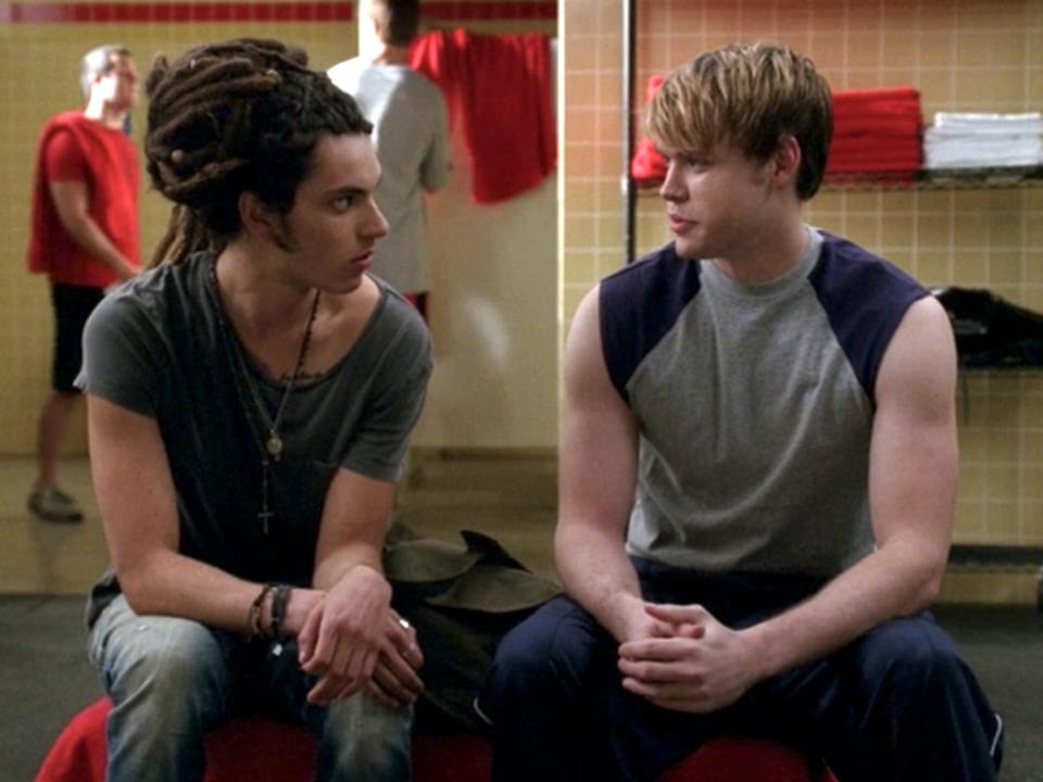 Samuel Larsen and Chord Overstreet in a locker room on "Glee"