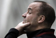 Houston Texans head coach Bill O'Brien watches Texas A&M quarterback Johnny Manziel perform drills during pro day in College Station, Texas, Thursday, March 27, 2014. (AP Photo/Patric Schneider)