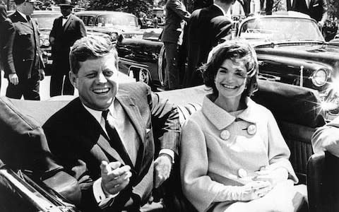 US President John F. Kennedy (L) and First Lady Jacqueline Kennedy in 1961 - Credit:  JFK PRESIDENTIAL LIBRARY